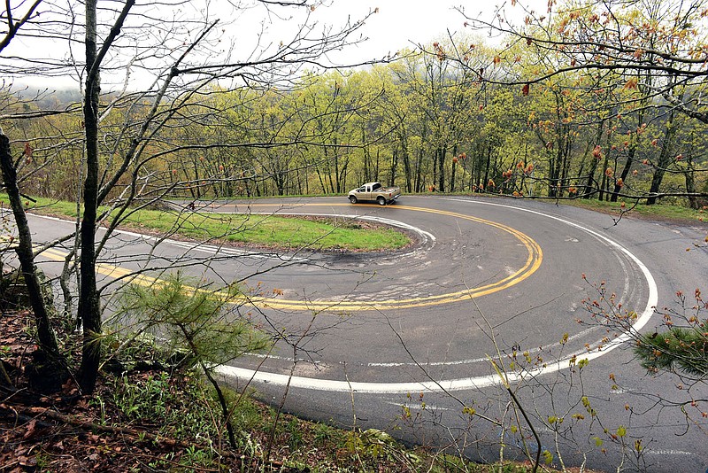 Switchbacks on Arkansas 103near Oark, seen here in April 2020,  make for a fun and scenic drive during autumn or any season.
(NWA Democrat-Gazette/Flip Putthoff)