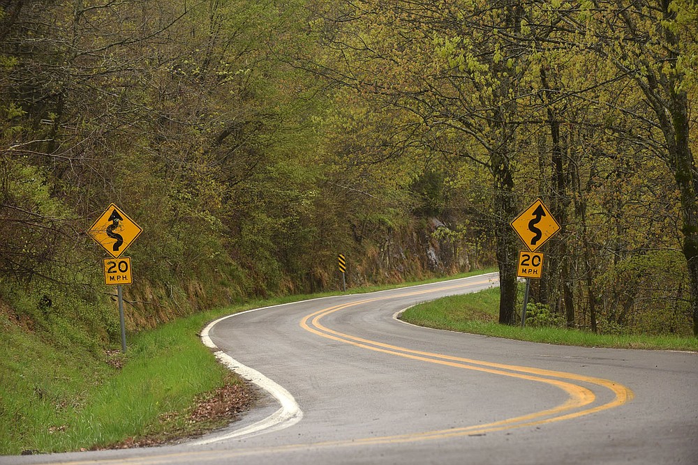 Curvy roads along Arkanas 103, seen here in April 2020, and Arkansas 215 keep drivers on their toes.
(NWA Democrat-Gazette/Flip Putthoff)
