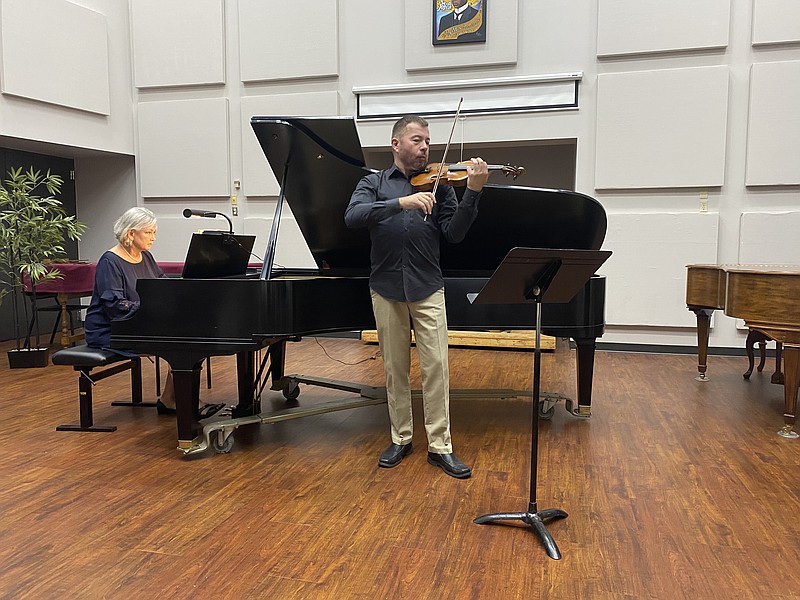 (Staff photo by Andrew Bell)

Mary Scott Smith (left) and Kiril Laskarov (right) played Sonata #2 in A major and finished with Scherzo (Sonatensatz) during the performance.