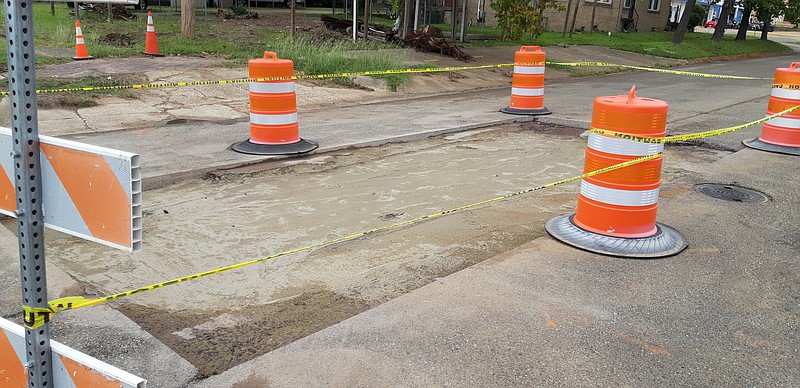 The Seventh Street sinkhole that has reduced travel lanes is close to being repaired. According to Heather Deaton, public information officer for Texas Department of Transportation, Atlanta District. The sinkhole was discovered last weekend near downtown Texarkana. Seventh Street is U.S. Highway 67 in Texarkana. “Texarkana Water Utility put in material to fill the void,” Deaton said. “They used loose liquid concrete, which will sit over the weekend. If it is ready, TxDOT will cover the area with asphalt pavement Monday. Weather delays not withstanding, work should be complete by close of business Monday.” (Staff photo by Junius Stone)