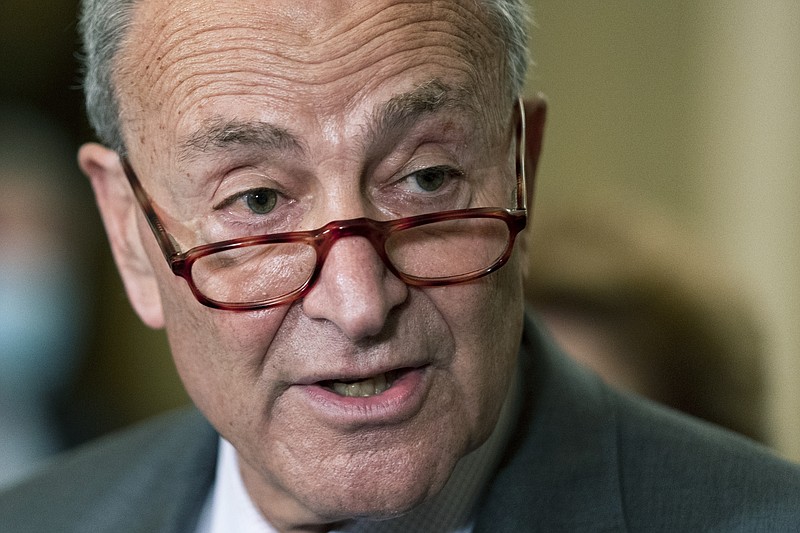 Senate Majority Leader Chuck Schumer of N.Y., speaks to reporters on Capitol Hill in Washington, Tuesday, Oct. 5, 2021. (AP Photo/Manuel Balce Ceneta)