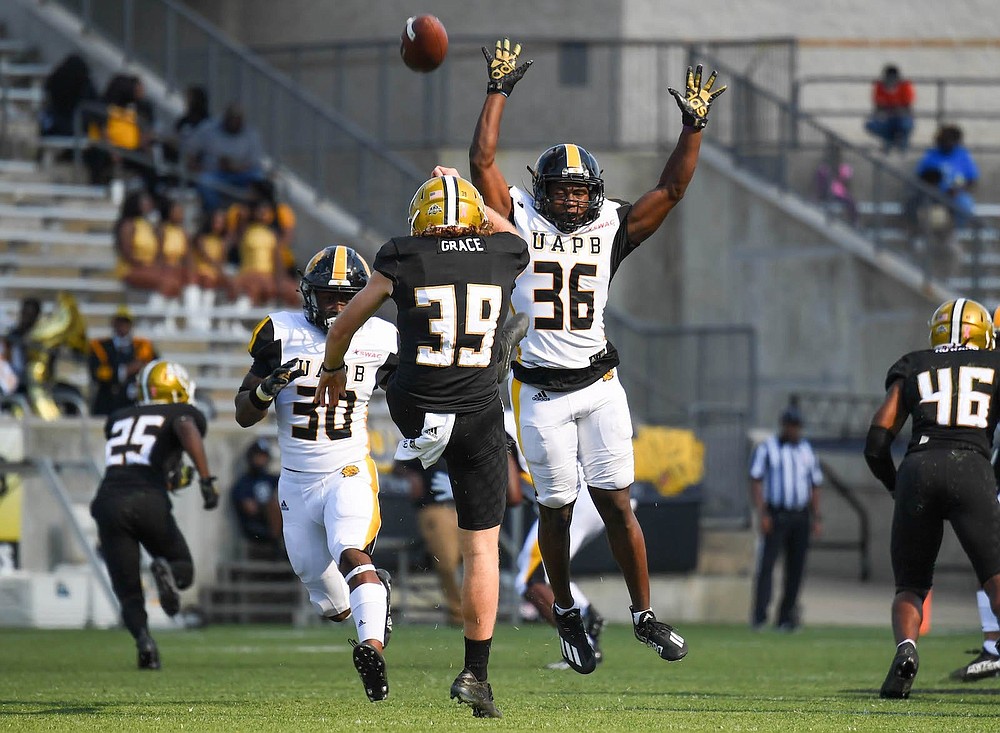 UAPB free safety Lawson Howard attempts to block a punt from Alabama State's Aubrey Grace on Saturday, Oct. 9, 2021. (Special to The Commercial/Brian Tannehill)