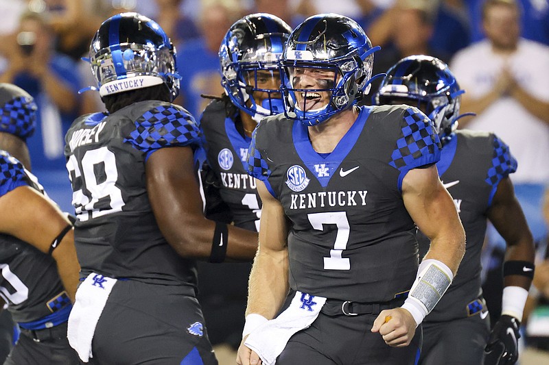 Kentucky quarterback Will Levis (7) celebrates a touchdown during the first half of the team's NCAA college football game against LSU in Lexington, Ky., Saturday, Oct. 9, 2021. (AP Photo/Michael Clubb)