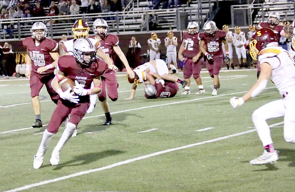 Mark Ross/Special to Siloam Sunday
Siloam Springs junior Nick Driscoll turns up field after making a catch Friday against Lake Hamilton.