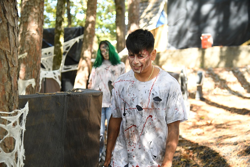 Zombies roam the grounds at Magic Springs Theme & Water Park. - Photo by Tanner Newton of The Sentinel-Record