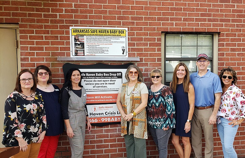 Hannah Pregnancy Resource Center staff gather around the city's new Safe Haven Baby Box at EFD Station 2 during its dedication ceremony on Tuesday. Hannah PRC played a pivotal role in the box's being located in El Dorado. (Contributed)