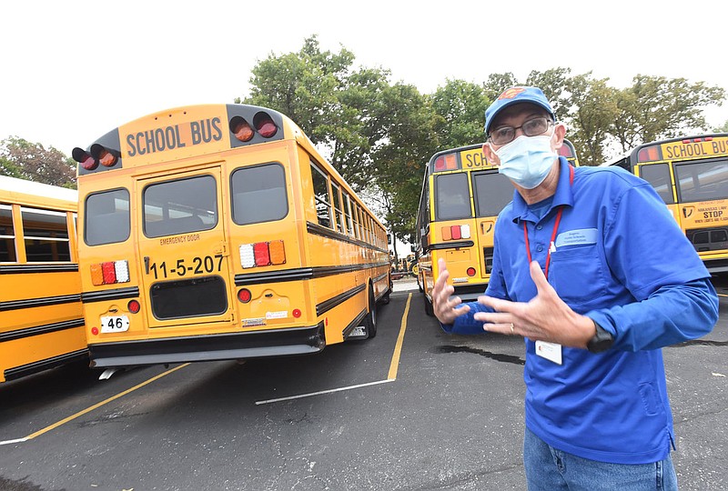 Lee Stubblefield, a school bus driver with Rogers public schools, talks Wednesday Oct. 6 2021 about his 28 years as a school bus driver. &quot;You've got to love kids to drive a school bus,&quot; Stubblefield said.
(NWA Democrat-Gazette/Flip Putthoff)