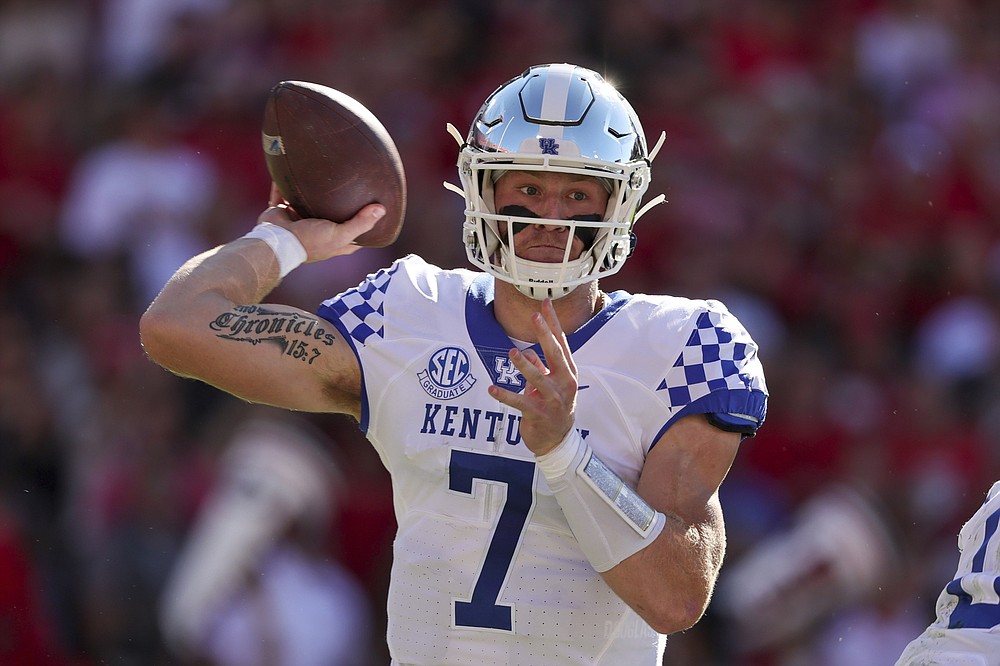 Kentucky quarterback Will Levis (7) throws a pass against Georgia during the first half of an NCAA college football game Saturday, Oct. 16, 2021 in Athens, Ga. (AP Photo/Butch Dill)