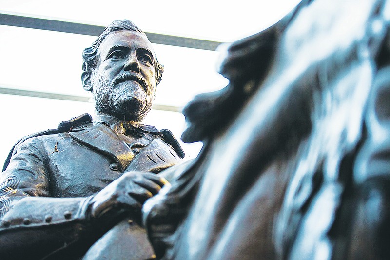 FILE - In this Dec. 20, 2018, file photo, the 1935 statue of Confederate Gen. Robert E. Lee, by sculptor Alexander Phimister, sits in storage at Hensley Field, the former Naval Air Station on the west side of Mountain Creek Lake in Dallas. The statue of Lee, which the city of Dallas removed from a park and later sold in an online auction, is now on display at a golf resort in West Texas, the Houston Chronicle reported, Friday, Oct. 15, 2021. (Ashley Landis/The Dallas Morning News via AP, File)