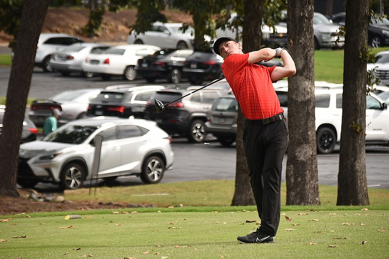 Staci Vandagriff Arkansas Democrat-Gazette
Farmington&#x201a;&#xc4;&#xf4;s Rhett South hits from the 10th tee during the Overall Championship on Oct. 14 at the Pleasant Valley Country Club in Little Rock.