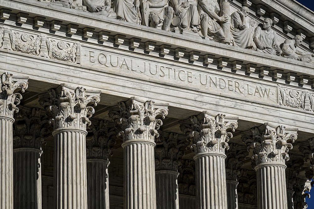 FILE - This Sept. 3, 2021, file photo shows the Supreme Court in Washington. The Biden administration is asking the Supreme Court to block the Texas law banning most abortions, while the fight over the measure’s validity plays out in the courts. The law has been in effect since September, aside from a district court-ordered pause that lasted just 48 hours. (AP Photo/J. Scott Applewhite, File)