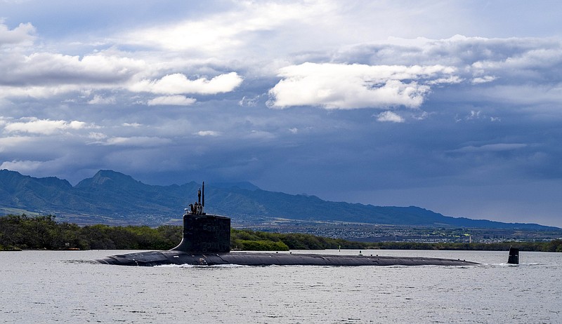 FILE - In this file photo provided by U.S. Navy, the Virginia-class fast-attack submarine USS Missouri (SSN 780) departs Joint Base Pearl Harbor-Hickam for a scheduled deployment in the 7th Fleet area of responsibility, Sept. 1, 2021. The foreign ministers of Malaysia and Indonesia expressed concern Monday, Oct. 18, 2021, that Australia&#x2019;s plan to acquire nuclear-powered submarines from the U.S. in a security alliance may increase the rivalry of major powers in Southeast Asia. (Amanda R. Gray/U.S. Navy via AP, File)