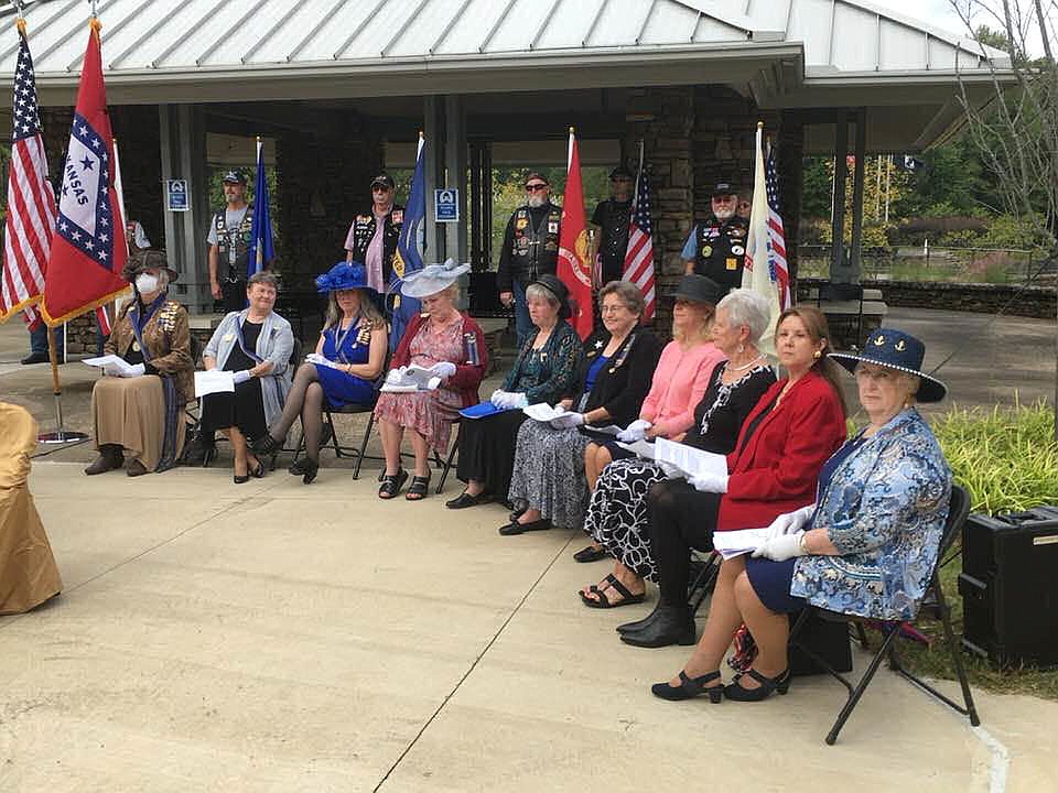 From left are Sheila Beatty-Krout, Jerrie Townsend, Kay Tatum, Junelle Mongno, Jo Ann Cooper, Kathy Balkman, Lucy Allen, Bobbie Lovell and Susan Veal. Each read a mini-bio of three or four veterans. Photo is courtesy of John Tatum. - Submitted photo