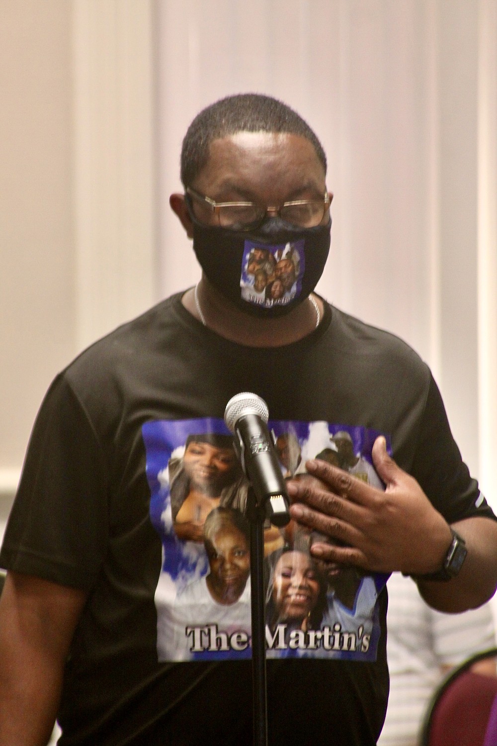 Keith Martin wears a picture of his late wife Tina Martin on his shirt and said her death has been hard on him and their children. (Pine Bluff Commercial/Eplunus Colvin)