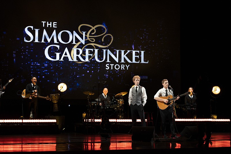 A band backs Ben Cooley (left) as Art Garfunkel and Taylor Bloom as Paul Simon in “The Simon & Garfunkel Story.” (Special to the Democrat-Gazette/Lane Peters)