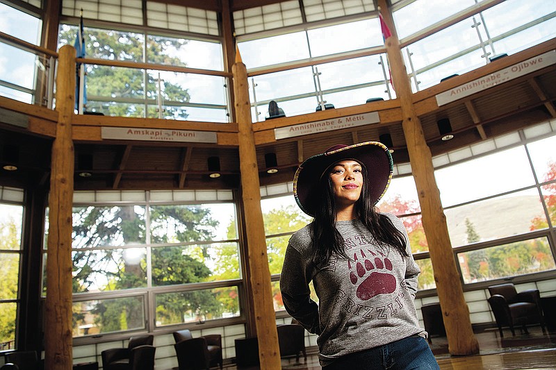 Aspen Decker, a linguistic master's student at the University of Montana and Salish language teacher, poses for a portrait on campus in Missoula, Mont., Thursday, Oct. 7, 2021. Decker is making it her goal to preserve the Salish language. (Ben Allan Smith/The Missoulian via AP)