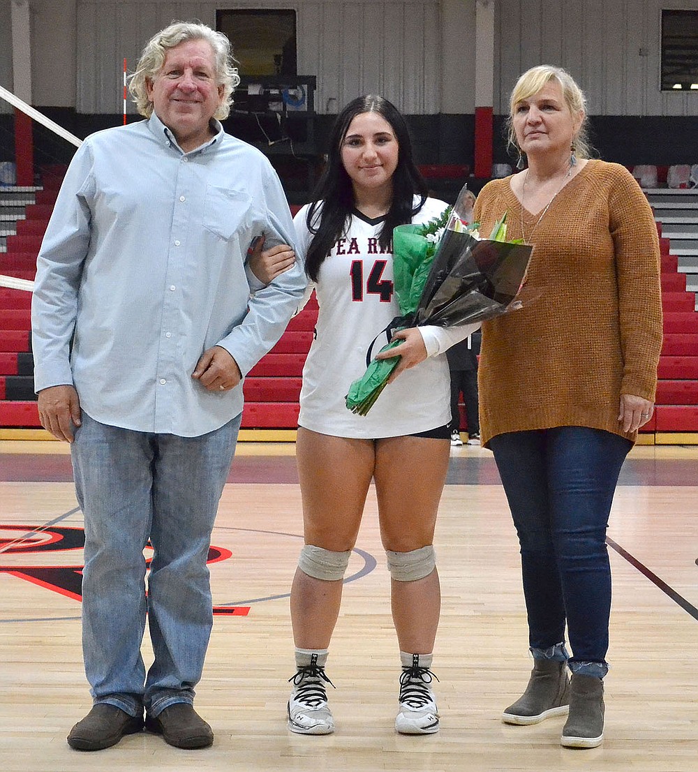 Izzy Smith was escorted by Lisa and Tim Salmonsen.