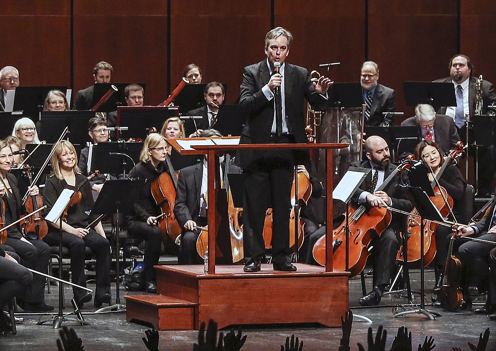 Arkansas Democrat-Gazette/MITCHELL PE MASILUN -- 2/8/2019 --
Associate Conductor Geoffrey Robson asks a question of the schoolchildren during the Arkansas Symphony Orchestra's 2019 ChildrenǃÙs Concert at the Robinson Center Friday, Feb 8, 2018 in Little Rock. The ASO performed for more than 2,200 school children from the 4th through 6th grades from around the state.