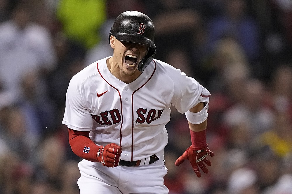 Boston Red Sox's Enrique Hernandez reacts after making an out against the Houston Astros during the fourth inning in Game 5 of baseball's American League Championship Series Wednesday, Oct. 20, 2021, in Boston. (AP Photo/David J. Phillip)