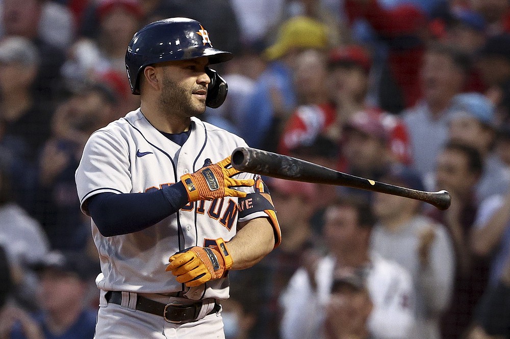 Houston Astros' Jose Altuve reacts after striking out against the Boston Red Sox during the third inning in Game 5 of baseball's American League Championship Series Wednesday, Oct. 20, 2021, in Boston. (AP Photo/Winslow Townson)