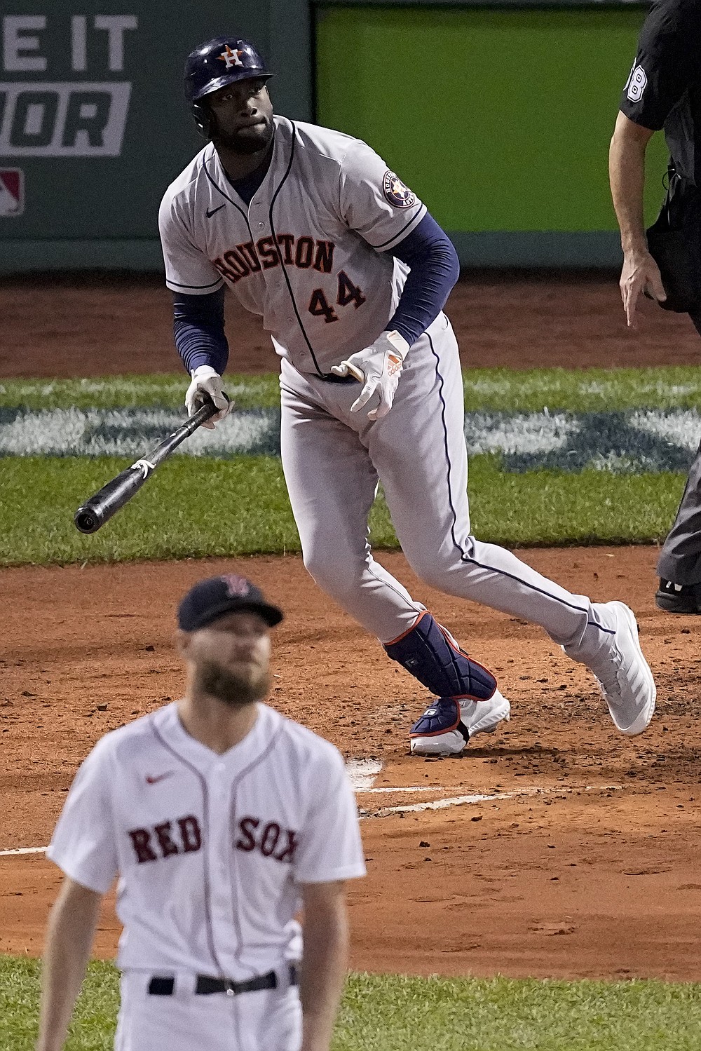 Houston Astros' Yordan Alvarez watches his single off Boston Red Sox starting pitcher Chris Sale during the fourth inning in Game 5 of baseball's American League Championship Series Wednesday, Oct. 20, 2021, in Boston. (AP Photo/Robert F. Bukaty)