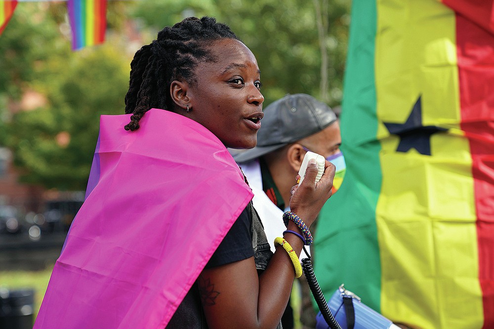 Ghanian activist Abena Hutchful leads a rally against a controversial bill being proposed in Ghana's parliament that would make identifying as LGBTQIA or an ally a criminal offense punishable by up to 10 years in prison, in the Harlem neighborhood of New York on Monday, Oct 11, 2021. The bill has received strong support from the country's most influencial clergy, including the Catholic Bishops' Conference. (AP Photo/Emily Leshner)