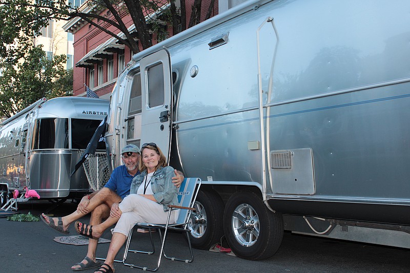 Mike and Jacque de Sosa, of Texas, are attending Airstreams on the Square for the first time this year. They were getting into the event's spirit Thursday afternoon, as evidenced by Mike's eye patch, following the "Pirates" theme of this year's event. (Caitlan Butler/News-Times)