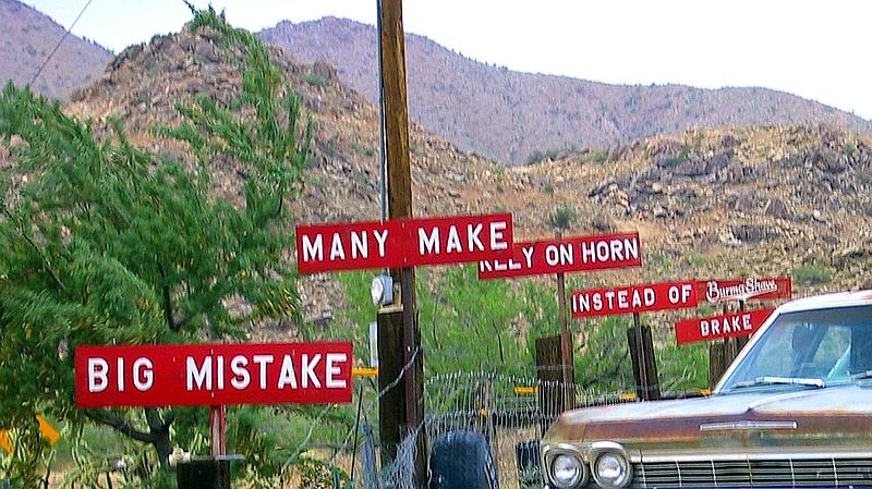 Series of Burma Shave signs along Route 66 in Hackberry, Arizona. It was part of an extensive roadside campaign to sell shaving cream. (Photo by Ken Koehler, now in public domain courtesy of its creator.)