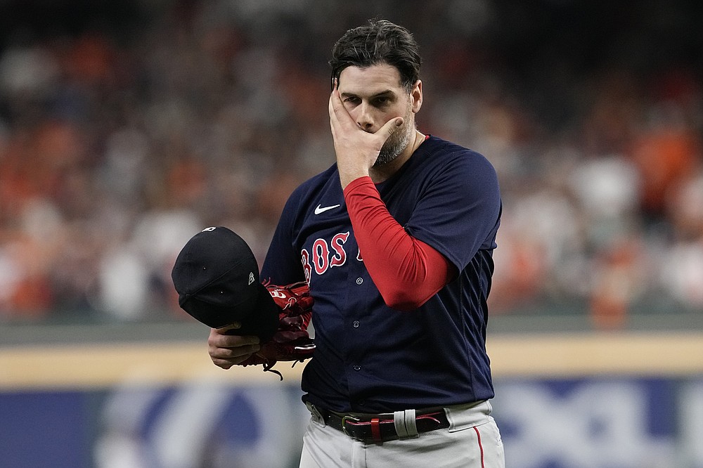 Boston Red Sox relief pitcher Adam Ottavino reacts after the eighth inning against the Houston Astros in Game 6 of baseball's American League Championship Series Friday, Oct. 22, 2021, in Houston. (AP Photo/Tony Gutierrez)