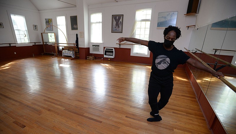 Dancer Blake Worthey of Fayetteville practices movement Saturday, Oct. 9, 2021, at the Fayetteville Dance Center in Fayetteville. Karen Castleman received a grant to organize, activate, and map the Northwest Arkansas dance community. Visit nwaonline.com/211010Daily/ for today's photo gallery.
(NWA Democrat-Gazette/Andy Shupe)