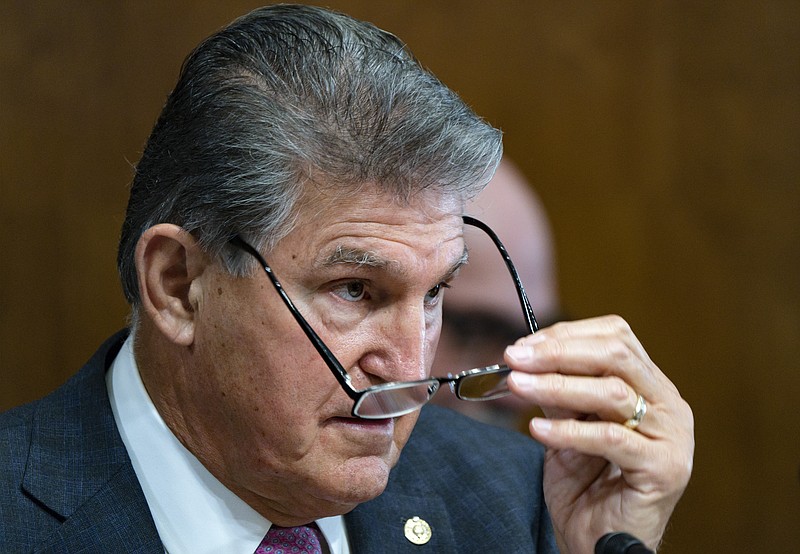 Sen. Joe Manchin, D-W.Va., a key holdout vote on President Joe Biden's domestic agenda, chairs a hearing of the Senate Energy and Natural Resources Committee, at the Capitol in Washington, Tuesday, Oct. 19, 2021. (AP Photo/J. Scott Applewhite)
