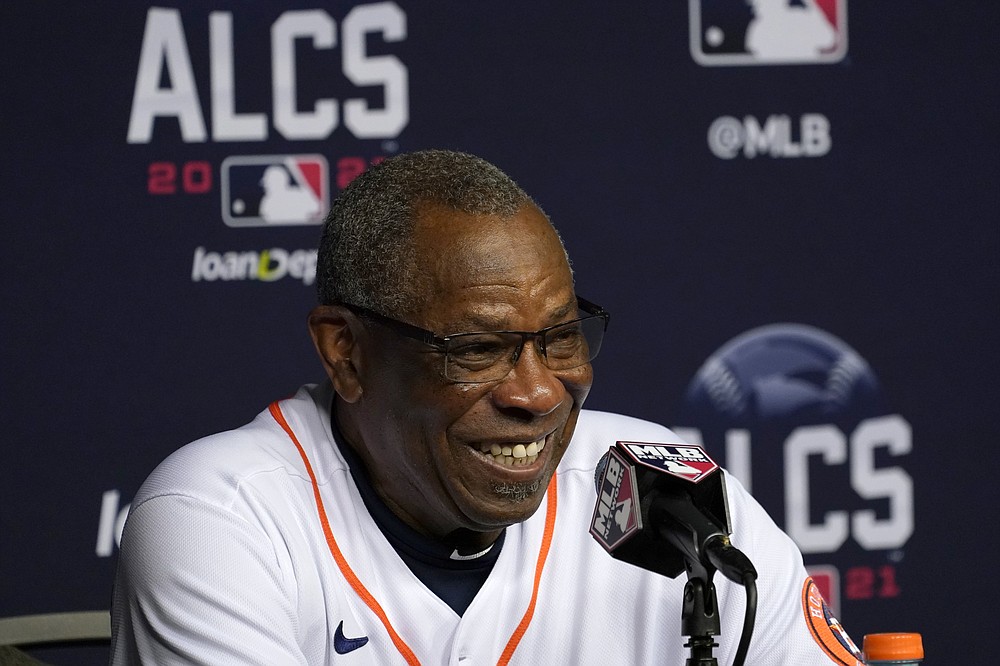 Houston Astros manager Dusty Baker smiles as he responds to questions during a baseball news conference in Houston, Thursday, Oct. 14, 2021. The Astros host the Boston Red Sox in Game 1 of the American League Championship Series on Friday. (AP Photo/Tony Gutierrez)