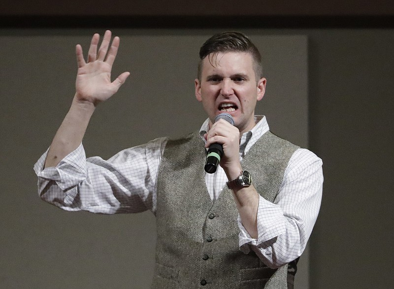 FILE - In this Dec. 6, 2016, file photo, Richard Spencer, who leads a movement that mixes racism, white nationalism and populism, speaks at the Texas A&amp;M University campus in College Station, Texas. A trial is beginning in Charlottesville, Virginia to determine whether white nationalists who planned the so-called &#x201c;Unite the Right&#x201d; rally will be held civilly responsible for the violence that erupted.   (AP Photo/David J. Phillip, File)