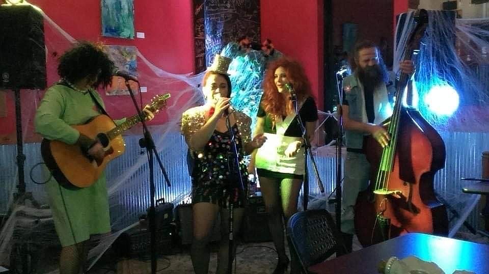 The Crumbs, featuring David Holland, Kara Holl, Tabitha Graves and Brandon Patterson, are a bluegrass/Americana band from Fort Smith. They perform their “Rocky Horror Pickin Show” on Saturday at Four Quarter Bar in North Little Rock. (Special to the Democrat-Gazette/The Crumbs)