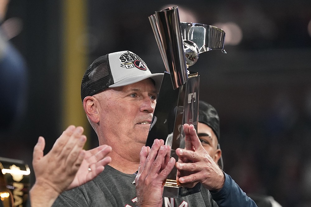 Atlanta Braves manager Brian Snitker with his wife Ronnie during