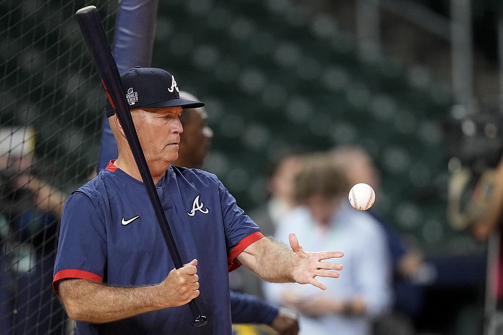 Manager Brian Snitker and son Troy: A thriving family baseball business