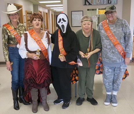 Westside Eagle Observer/SUSAN HOLLAND
Winners of the costume contest at the Billy V. Hall Senior Activity Center pose with their trophies just before lunch at the Center Tuesday, Oct. 26. Pictured are Jeanie Easley, best costume; Penny Leonard, funniest costume; Fran Croxdale, scariest costume; and Linda Hartzell and Marisa Atteberry, best couple costume.