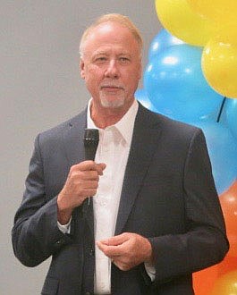 Westside Eagle Observer/SUSAN HOLLAND
Dr. Richard Page speaks to guests at the Bright Futures fifth anniversary celebration Thursday, Oct. 28. Dr. Page, who was instrumental in starting Bright Futures in Gravette, gave a brief history of the early years of the group. He is a former superintendent of Gravette schools.