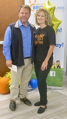 Westside Eagle Observer/SUSAN HOLLAND
Mayor Kurt Maddox and his wife Dawn pose for a photo following the Gravette Bright Futures fifth anniversary celebration. Dawn is a member of the Bright Futures advisory board which is made up of representatives of community, faith-based, human services and school organizations.