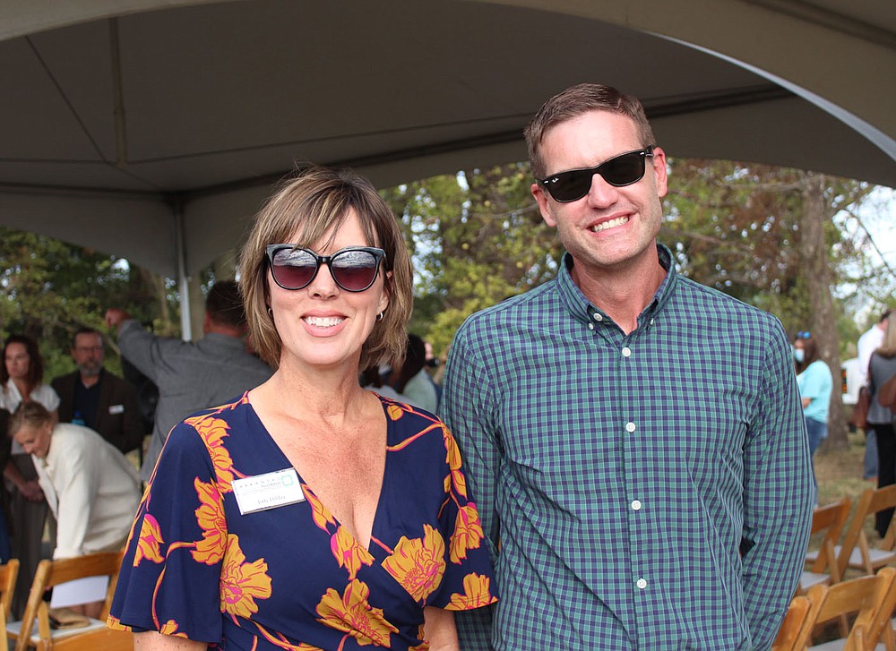 Jody Dilday and Chad Oglesby visit the Children's Safety Center Announcement Celebration on October 12. (NWA Democrat-Gazette / Carin Schoppmeyer)