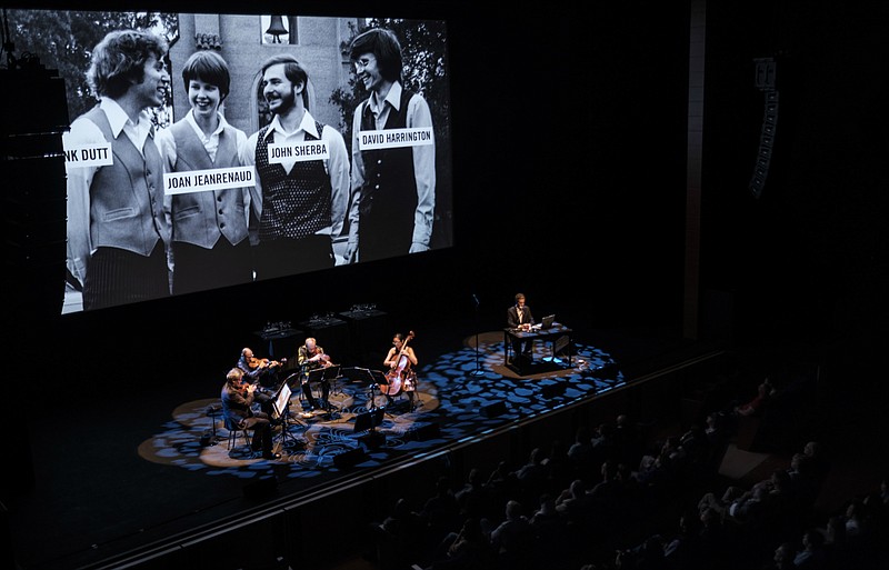 Kronos Quartet plays the music while filmmaker Sam Green narrates and black-and-white images cross the screen in the live documentary “A Thousand Thoughts,” Saturday and Nov. 14 at the Momentary’s RØDE House in Bentonville. (Special to the Democrat-Gazette/Waleed Shah)