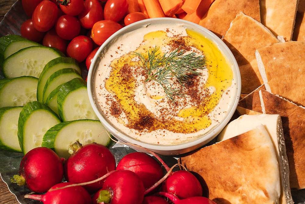 Creamy lemon hummus. Food styling by Shannon Kinsella. (Kristen Mendiola/The Daily Meal/TNS)