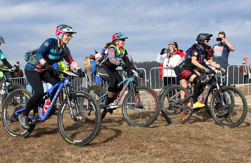 Participants pedal out from the starting line at the annual Attila the Hun Mountain Bike Race. - File photo by The Sentinel-Record
