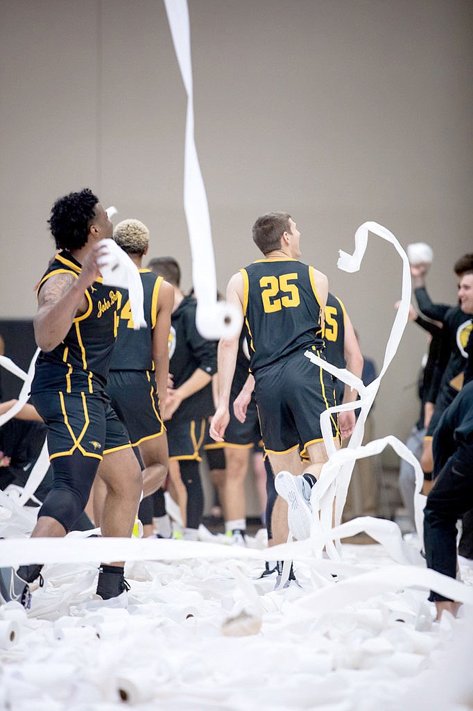 Photo courtesy of JBU Sports Information
Toilet paper covers the floor of Bill George Arena after John Brown's first made field goal Friday against Barclay (Kan.) in the annual Toilet Paper Game.