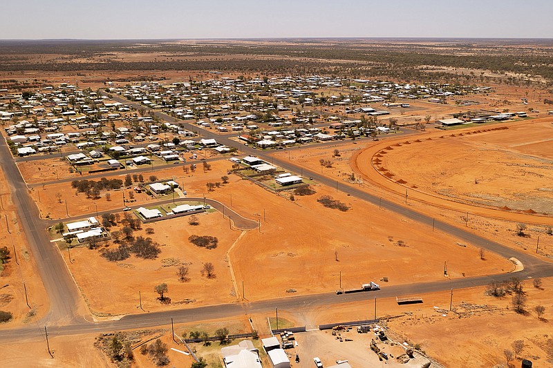 The Australian Outback town of Quilpie is photographed from the air, on Oct. 2, 2021. Quilpie had hoped its offer of a free residential block of land to anyone who would make it their home might attract five new families to the remote community of 800. But authorities have been overwhelmed by more than 250 enquires in less than two weeks from around Australia and internationally. (Leon O'Neil via AP)