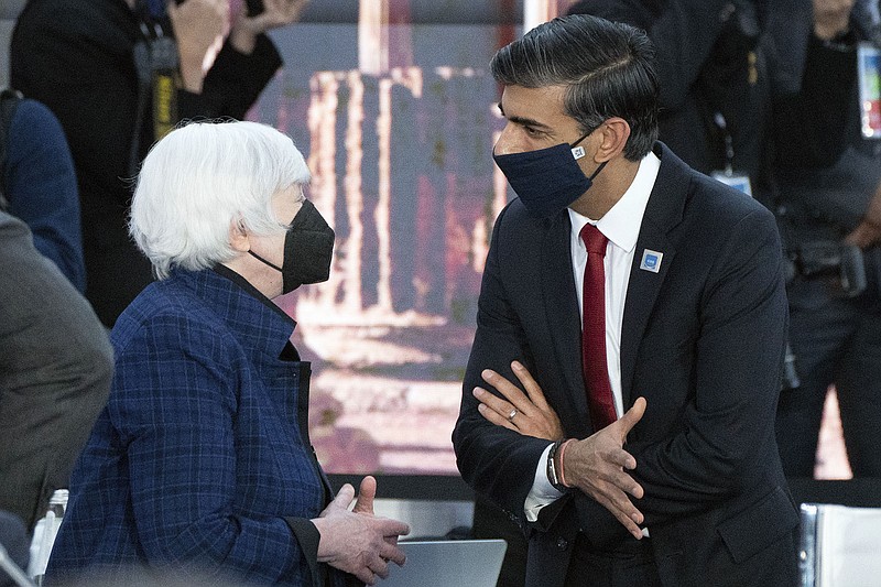 Britain's Treasury chief Rishi Sunak, right, talks to U.S. Treasure Secretary Janet Yellen during the opening session of the G20 summit at the La Nuvola conference center, in Rome, Saturday, Oct. 30, 2021. The two-day Group of 20 summit is the first in-person gathering of leaders of the world's biggest economies since the COVID-19 pandemic started. (Stefan Rousseau/Pool Photo via AP)