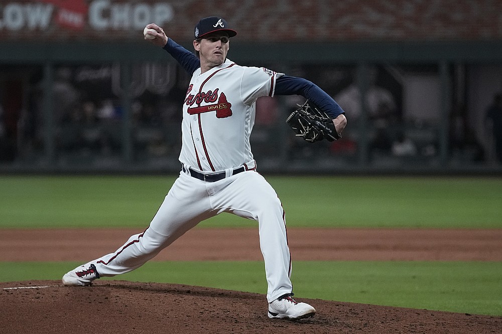 Atlanta Braves starting pitcher Kyle Wright throws during the second inning in Game 4 of baseball's World Series between the Houston Astros and the Atlanta Braves Saturday, Oct. 30, 2021, in Atlanta. (AP Photo/Ashley Landis)