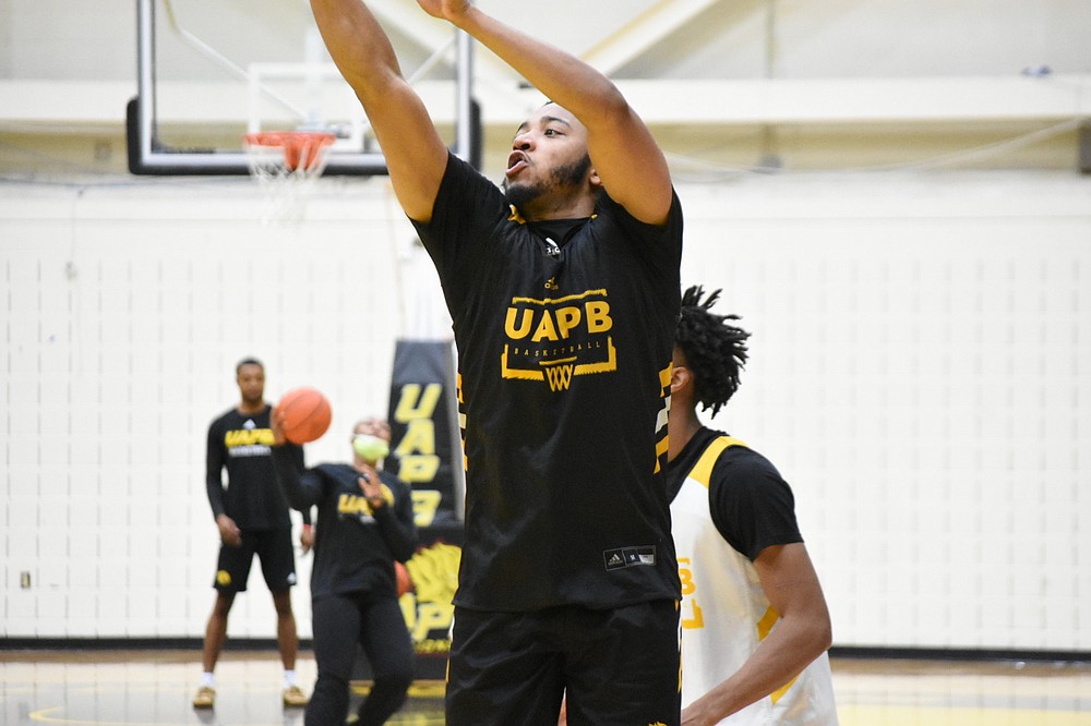 UAPB senior guard Shawn Williams practices 3-point shots during practice Thursday, Oct. 28, 2021. (Pine Bluff Commercial/I.C. Murrell)