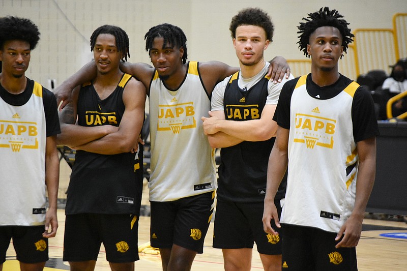 From left, UAPB players Isaiah Haralson, Kylen Milton, Brandon Brown, Brahm Harris and Travonta Doolittle gather during a drill at practice on Thursday, Oct. 28, 2021. (Pine Bluff Commercial/I.C. Murrell)