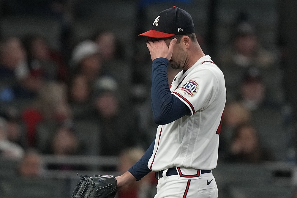 Atlanta Braves pitcher Drew Smyly leaves the field during the ninth inning in Game 5 of baseball's World Series between the Houston Astros and the Atlanta Braves Monday, Nov. 1, 2021, in Atlanta. (AP Photo/Brynn Anderson)